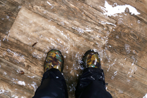 Avoid slick surfaces when choosing aging-in-place kitchen flooring. 