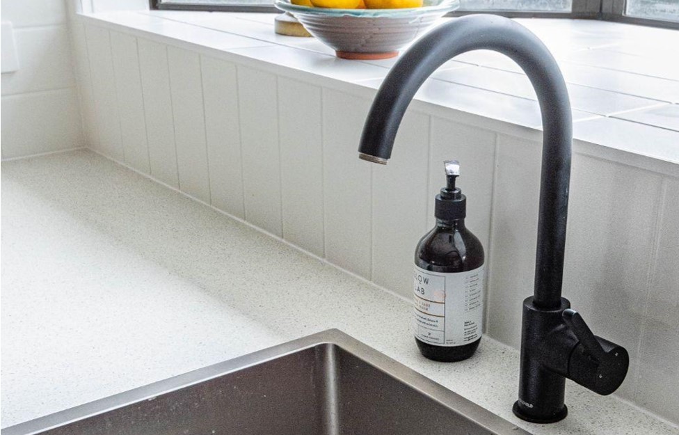 black faucet in kitchen