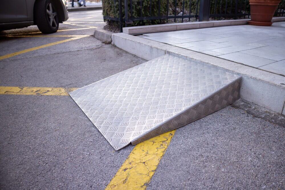 ramp for disabled persons on wheelchair at building entrance